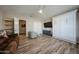 Comfortable bedroom with a queen bed and a wall-mounted TV at 19418 N 86Th Dr, Peoria, AZ 85382