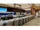 Upscale bar with modern design, long counter, and stunning mountain views at 37200 N Cave Creek Rd # 1119, Scottsdale, AZ 85262