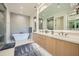 Luxurious bathroom with a freestanding soaking tub and double vanity at 37200 N Cave Creek Rd # 1119, Scottsdale, AZ 85262