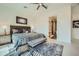 Bright bedroom with ensuite bathroom access and a cozy sitting area at 37200 N Cave Creek Rd # 1119, Scottsdale, AZ 85262