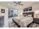 Comfortable bedroom with sliding doors opening to a private patio at 37200 N Cave Creek Rd # 1119, Scottsdale, AZ 85262