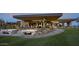 Luxury clubhouse with outdoor seating and fire pit at 37200 N Cave Creek Rd # 1119, Scottsdale, AZ 85262