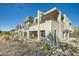 Modern home exterior with contemporary design and landscaping at 37200 N Cave Creek Rd # 1119, Scottsdale, AZ 85262