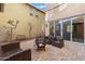 Courtyard with fire pit and seating area at 3836 E Gideon Way, Gilbert, AZ 85296