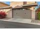 Attached garage with double doors, providing ample parking at 3836 E Gideon Way, Gilbert, AZ 85296