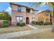 Two-story townhome with front yard and walkway at 3836 E Gideon Way, Gilbert, AZ 85296