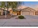 Inviting front exterior of a two-story home with a three-car garage at 4226 W Avenida Del Rey --, Phoenix, AZ 85083