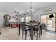 Bright dining area with a table and chairs near the kitchen at 438 E Palomino Way, San Tan Valley, AZ 85143