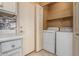 Laundry room with washer, dryer, and storage at 6730 E Preston St # 25, Mesa, AZ 85215