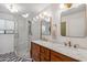 Modern bathroom with double vanity and a large walk-in shower at 7255 N 12Th St, Phoenix, AZ 85020