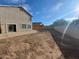 Large backyard with a view of the house at 7402 S 40Th Ln, Phoenix, AZ 85041