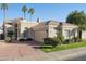 Single-story home with a two-car garage and desert landscaping at 8342 E Cortez Dr, Scottsdale, AZ 85260