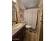 Clean bathroom with single vanity and shower/tub combo at 8600 E Broadway Rd # 55, Mesa, AZ 85208