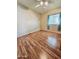 Bedroom with wood-look flooring and ceiling fan at 8600 E Broadway Rd # 55, Mesa, AZ 85208