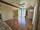 Living room features wood-look flooring and a ceiling fan at 8600 E Broadway Rd # 55, Mesa, AZ 85208