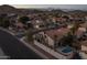 House with pool, aerial view at dusk at 9411 S 45 Pl, Phoenix, AZ 85044