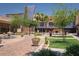 Outdoor community center with seating, landscaping, and walking paths at 1137 W Castle Dr, Casa Grande, AZ 85122