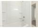 Clean bathroom with a shower/tub combo and built-in shelving at 1152 S Avoca --, Mesa, AZ 85208