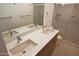 Clean bathroom with double vanity and shower at 1217 N Miller Rd # 8, Scottsdale, AZ 85257