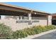 Scottsdale Gardens community entrance with landscaping at 1217 N Miller Rd # 8, Scottsdale, AZ 85257