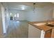 Bright living room with light wood floors and access to a patio at 1217 N Miller Rd # 8, Scottsdale, AZ 85257