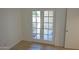 View of private patio through French doors at 1217 N Miller Rd # 8, Scottsdale, AZ 85257