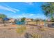 Community playground with play structures and shaded seating at 12375 W Palmaire Ave, Glendale, AZ 85307