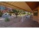 Covered patio with seating area and view of the backyard at 12434 W Eveningside Dr, Sun City West, AZ 85375