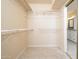 Large walk-in closet with wire shelving and ample storage at 12434 W Eveningside Dr, Sun City West, AZ 85375