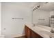 Bathroom with double vanity and wood cabinets at 1328 S Mckemy St, Tempe, AZ 85281