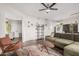 Living area with mid-century modern furniture and a view of the hallway at 15225 N 100Th St # 2224, Scottsdale, AZ 85260