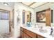 Bathroom with double vanity and large art at 2636 E Lupine Ave, Phoenix, AZ 85028