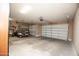 Garage with golf cart and extra storage space at 27238 W Mohawk Ln, Buckeye, AZ 85396