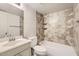 Bathroom with a shower/tub combo and tile surround at 3120 N 67Th Ln # 47, Phoenix, AZ 85033
