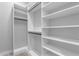 Spacious walk-in closet with ample shelving and hanging space for clothes at 3331 N 24Th Pl, Phoenix, AZ 85016