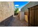 Side yard with storage shed and gate at 35920 W Cartegna Ln, Maricopa, AZ 85138