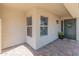 Welcoming front entry with a covered porch and paver walkway at 3938 E Morrow Dr, Phoenix, AZ 85050