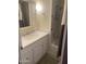 Bathroom with white vanity, tub, and shower at 4065 E University Dr # 155, Mesa, AZ 85205