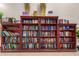 Well-stocked community library with bookshelves at 4486 W Crescent Rd, Queen Creek, AZ 85144