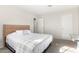 Light and airy bedroom featuring a queen bed and closet at 4725 N 14Th Ave, Phoenix, AZ 85013