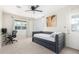 Cozy bedroom with daybed, ceiling fan, and window at 4725 N 14Th Ave, Phoenix, AZ 85013
