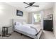 Bright bedroom with a full-size bed, dresser, and window at 4725 N 14Th Ave, Phoenix, AZ 85013