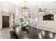 Open concept dining room with kitchen views and breakfast bar at 4725 N 14Th Ave, Phoenix, AZ 85013