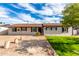 Ranch style home with landscaped lawn and driveway at 4725 N 14Th Ave, Phoenix, AZ 85013