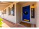 Inviting front entrance with a bright blue door and wreath at 4725 N 14Th Ave, Phoenix, AZ 85013