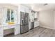 Kitchen features white cabinets and stainless steel appliances at 4725 N 14Th Ave, Phoenix, AZ 85013