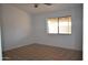 Bedroom with tile floors and a ceiling fan at 7571 W Pasadena Ave, Glendale, AZ 85303