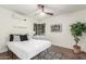 Bright bedroom with a queen bed and stylish decor at 819 W Solano Dr, Phoenix, AZ 85013