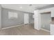 Kitchen area with white cabinets and light wood-look floors at 871 W Dewey Ave, Coolidge, AZ 85128