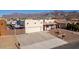 House exterior with driveway and mountain views at 10188 E La Palma Ave, Gold Canyon, AZ 85118